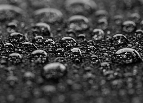 "Waterproof textile  with water droplets. Close - up, macro. Very shallow DOF. The grain and texture added.SEE ALSO:"